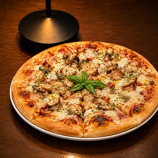 The Cloud special pizza with basil on top, from the Cloud Café & Bar oven.